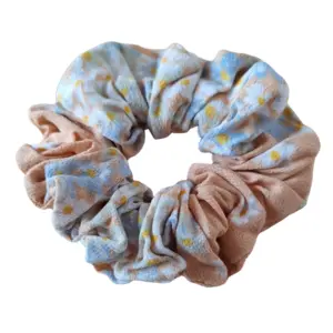 Peach hair scrunchie with daisies